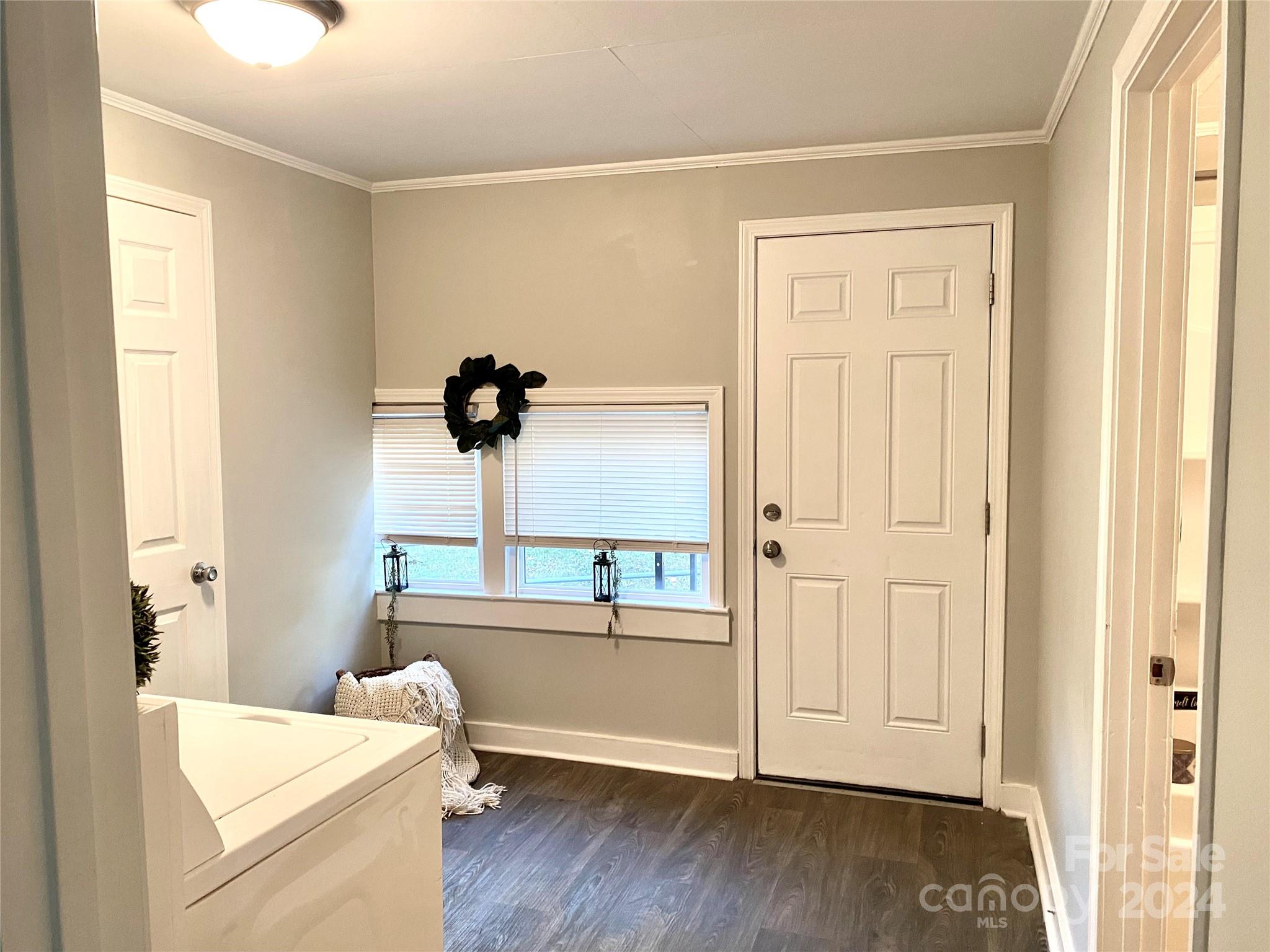 417 East Rice Street Landis, NC 28088 - Photo 14 of 22 a view of a bedroom with a window and wooden floor
