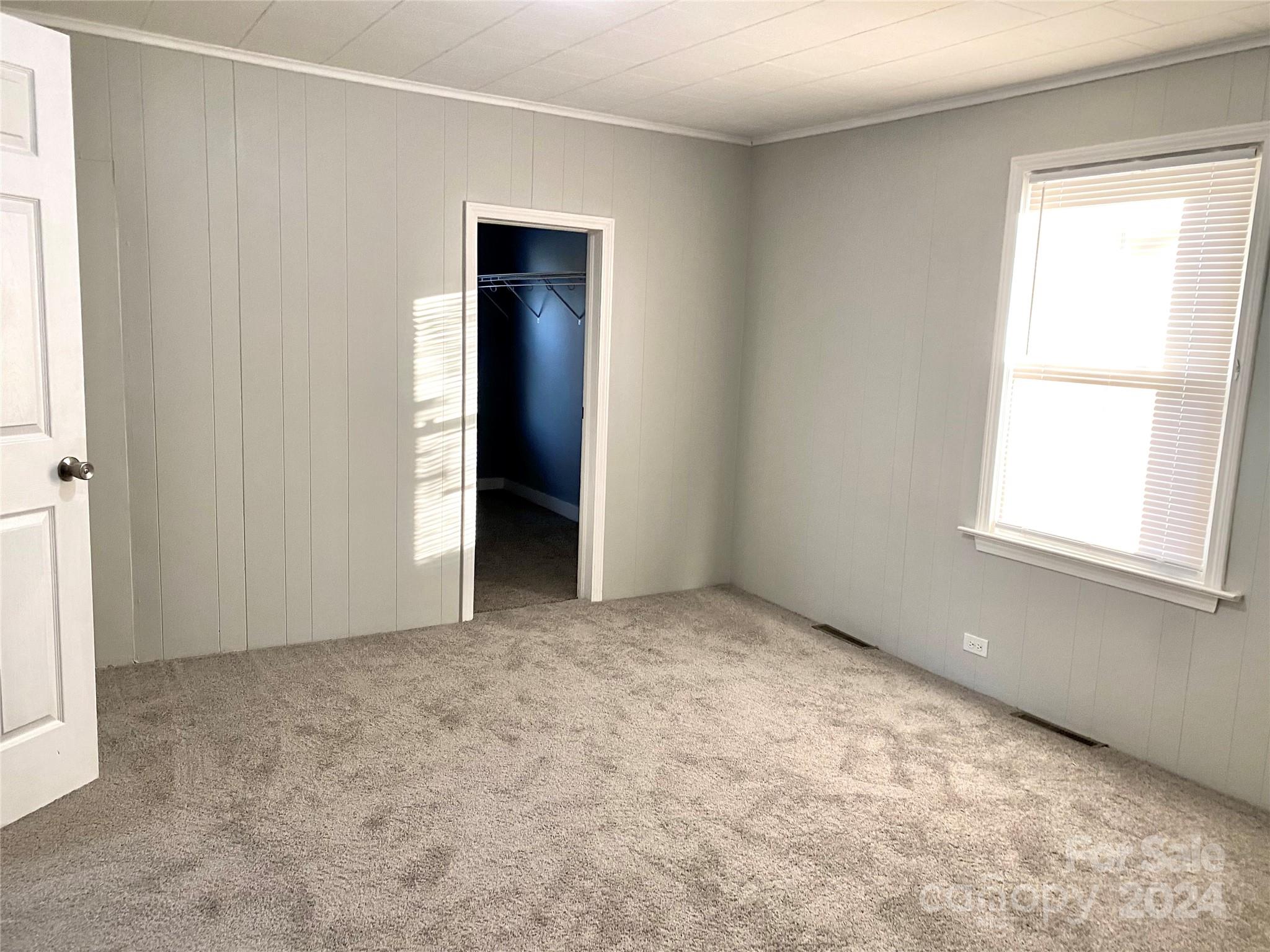 417 East Rice Street Landis, NC 28088 - Photo 17 of 22 an empty room with windows