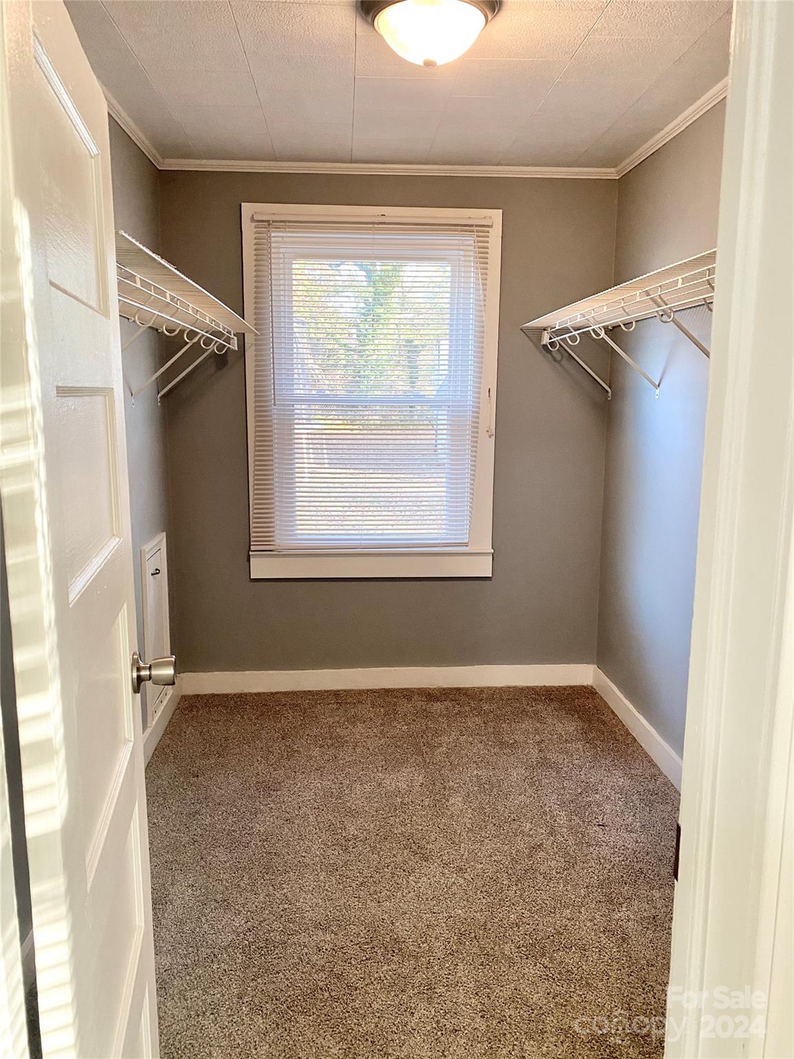 417 East Rice Street Landis, NC 28088 - Photo 18 of 22 an empty room with a window
