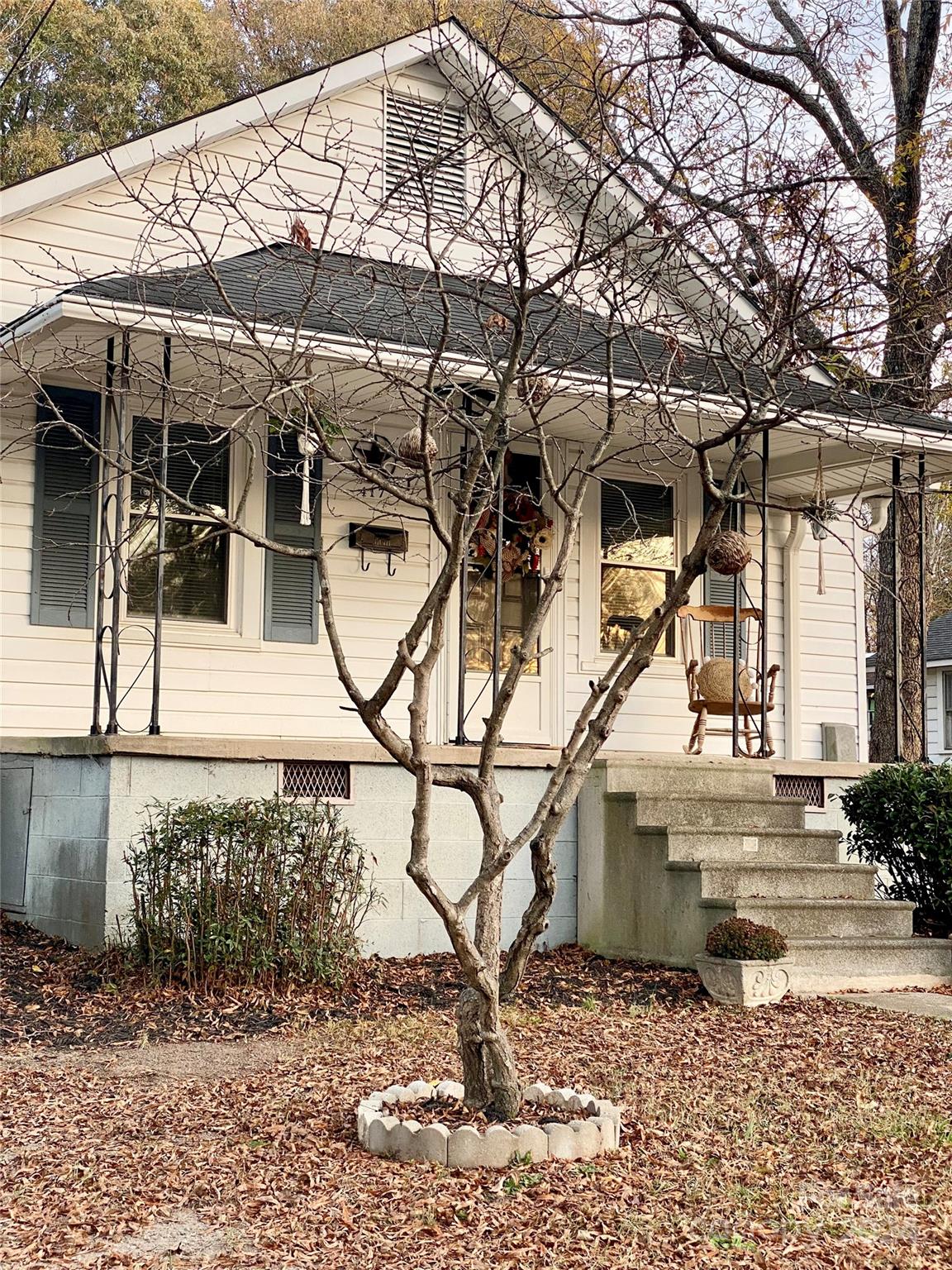 417 East Rice Street Landis, NC 28088 - Photo 2 of 22 a picture of a building with a tree