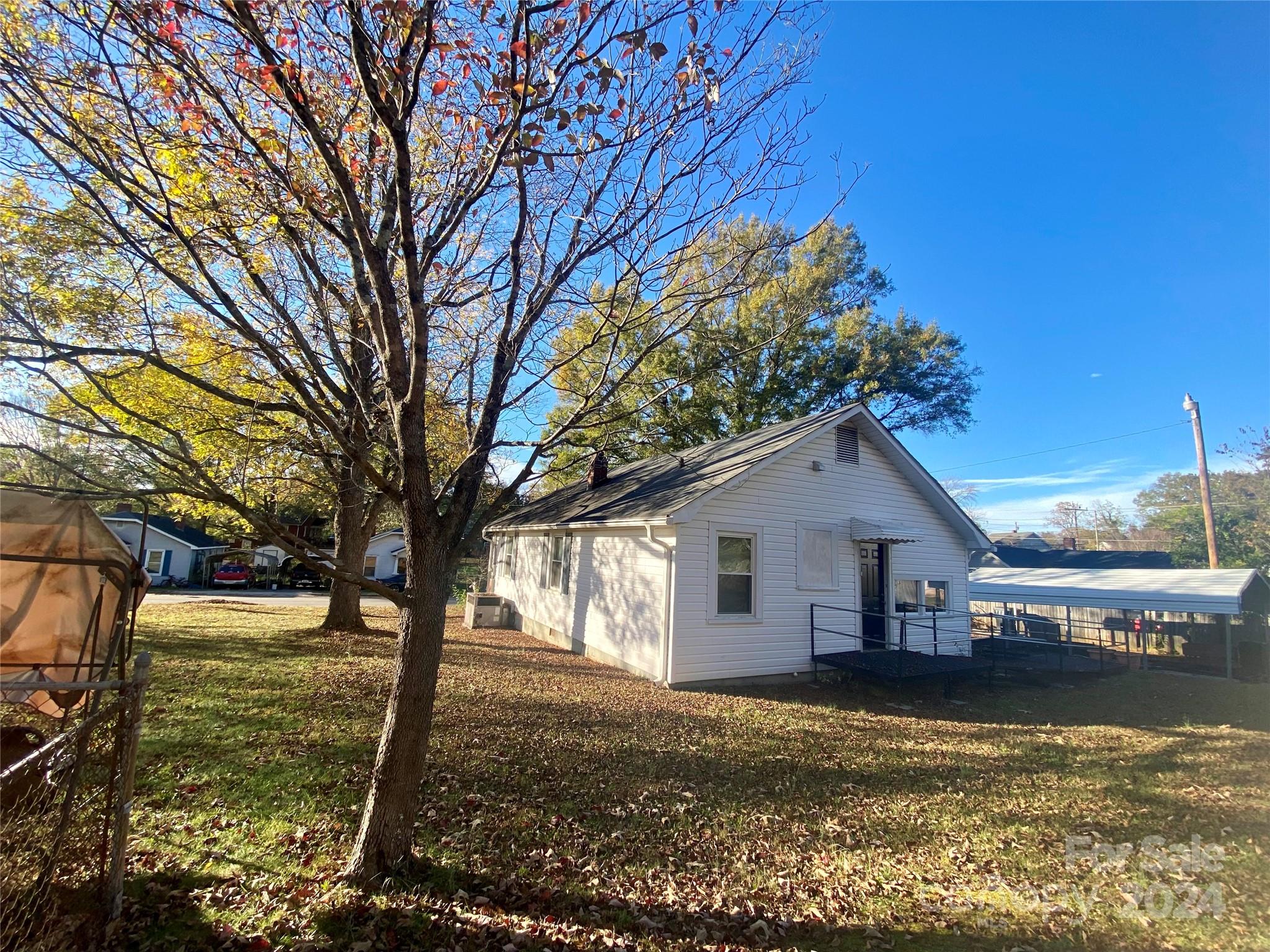 417 East Rice Street Landis, NC 28088 - Photo 22 of 22 a view of a house with a yard