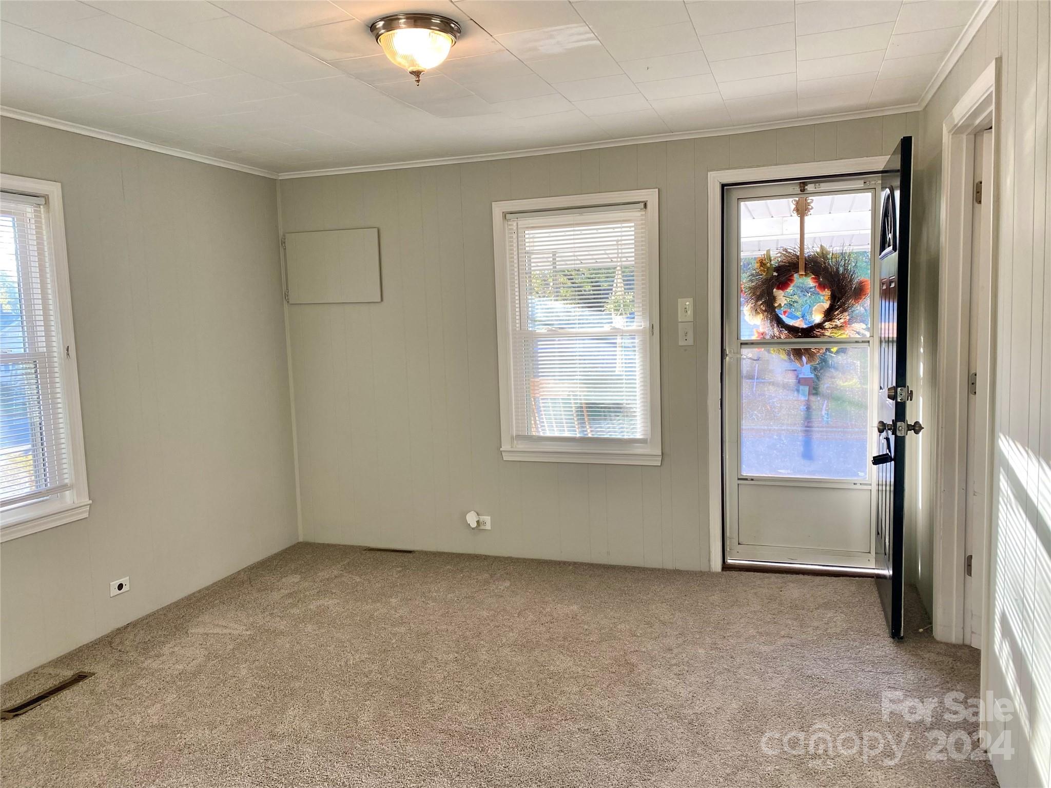 417 East Rice Street Landis, NC 28088 - Photo 6 of 22 an empty room with windows and closet
