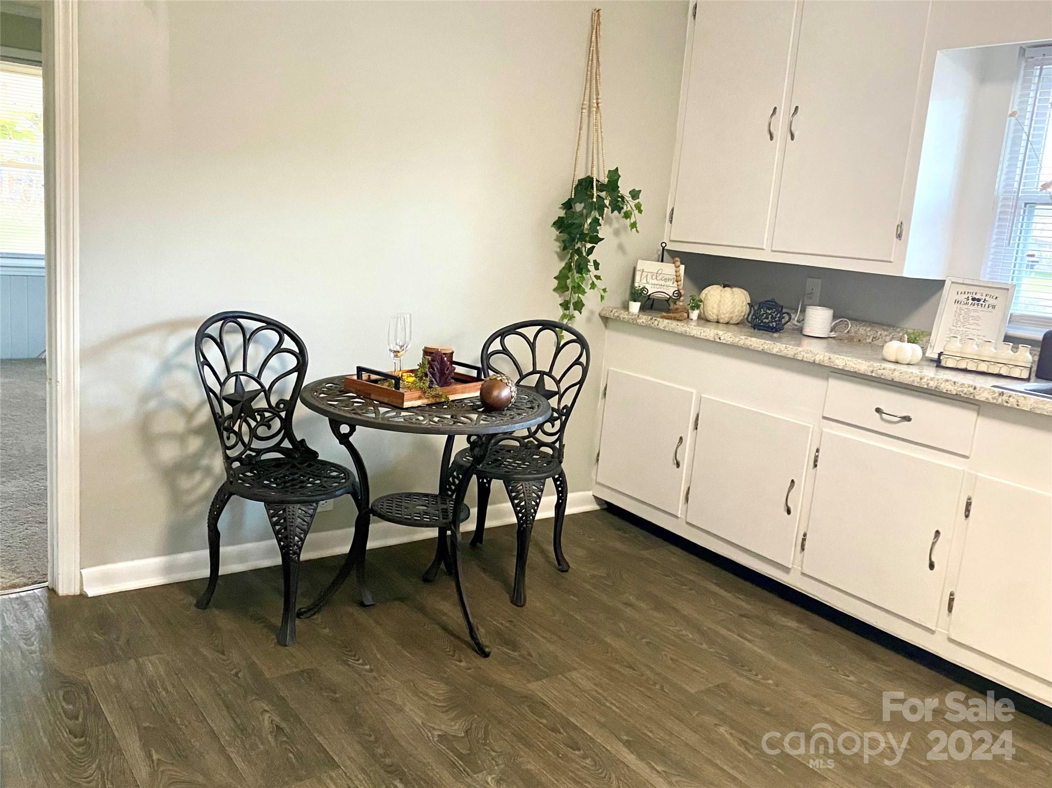 417 East Rice Street Landis, NC 28088 - Photo 10 of 22 a dining room with furniture and wooden floor