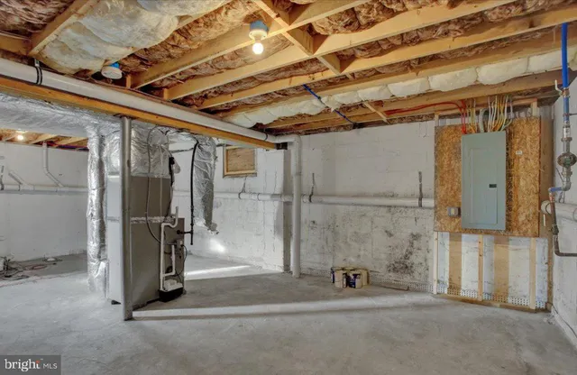 a view of a room with wooden walls