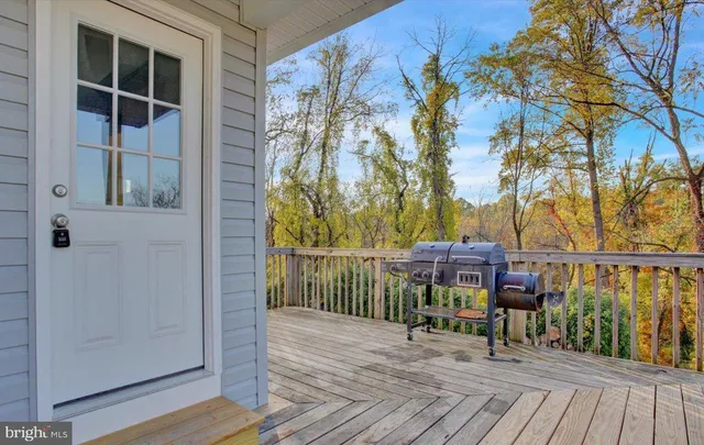 a view of balcony with furniture