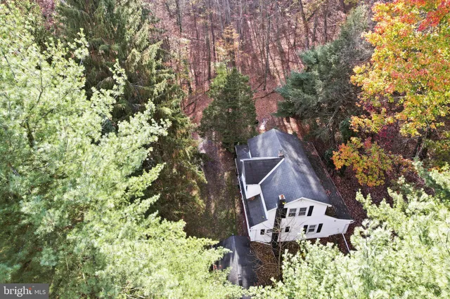 a view of a mountain range in a cloudy sky