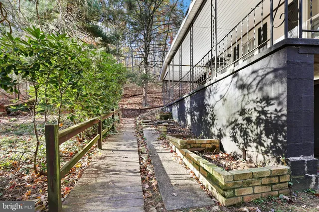 a bathroom with a toilet sink and shower