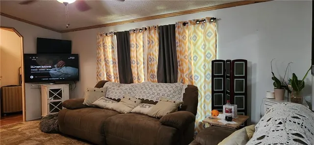 a bathroom with a toilet sink and shower