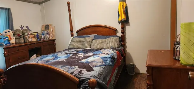 a living room with furniture and a bathtub