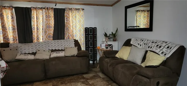 a view of bathroom with a black and white checkered curtain