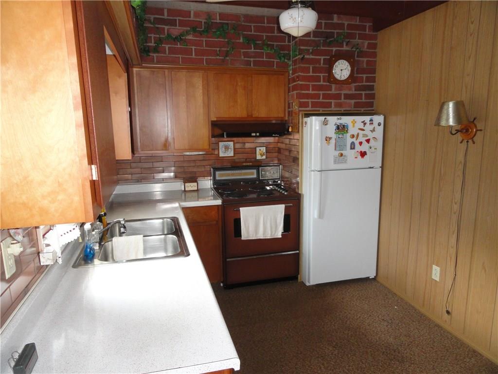 10 Garfield Road Latrobe, PA 15650 - Photo 5 of 12 Beautiful cabinets in this cozy kitchen.