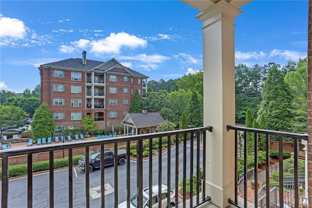 2300 Peachford Road, Unit 1209 Atlanta, GA 30338 - Photo 27 of 31 a view of a brick building from a balcony