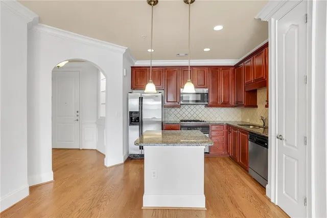 a kitchen with granite countertop a sink and a granite counter tops
