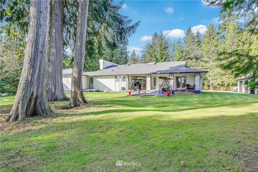 3602 220th Street Southeast Bothell, WA 98021 - Photo 38 of 40 a view of a house with a yard
