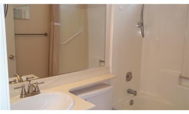 1448 Panorama Ridge Road Oceanside, CA 92056 - Photo 14 of 25 Both bedrooms share a bathroom which has a new sink, faucet & 2 new medicine cabinets.