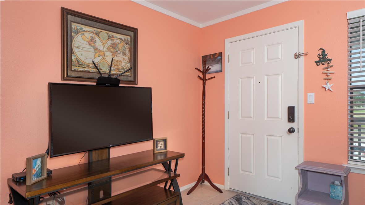 2290 North Fulton Beach Road Rockport, TX 78382 - Photo 13 of 26 a view of room with furniture and a window