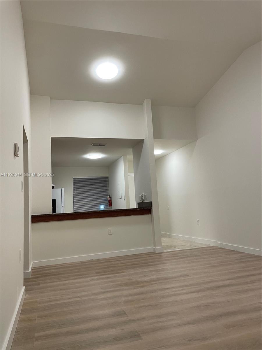 2179 Southwest 80th Terrace Miramar, FL 33025 - Photo 12 of 14 a view of a room with wooden floor