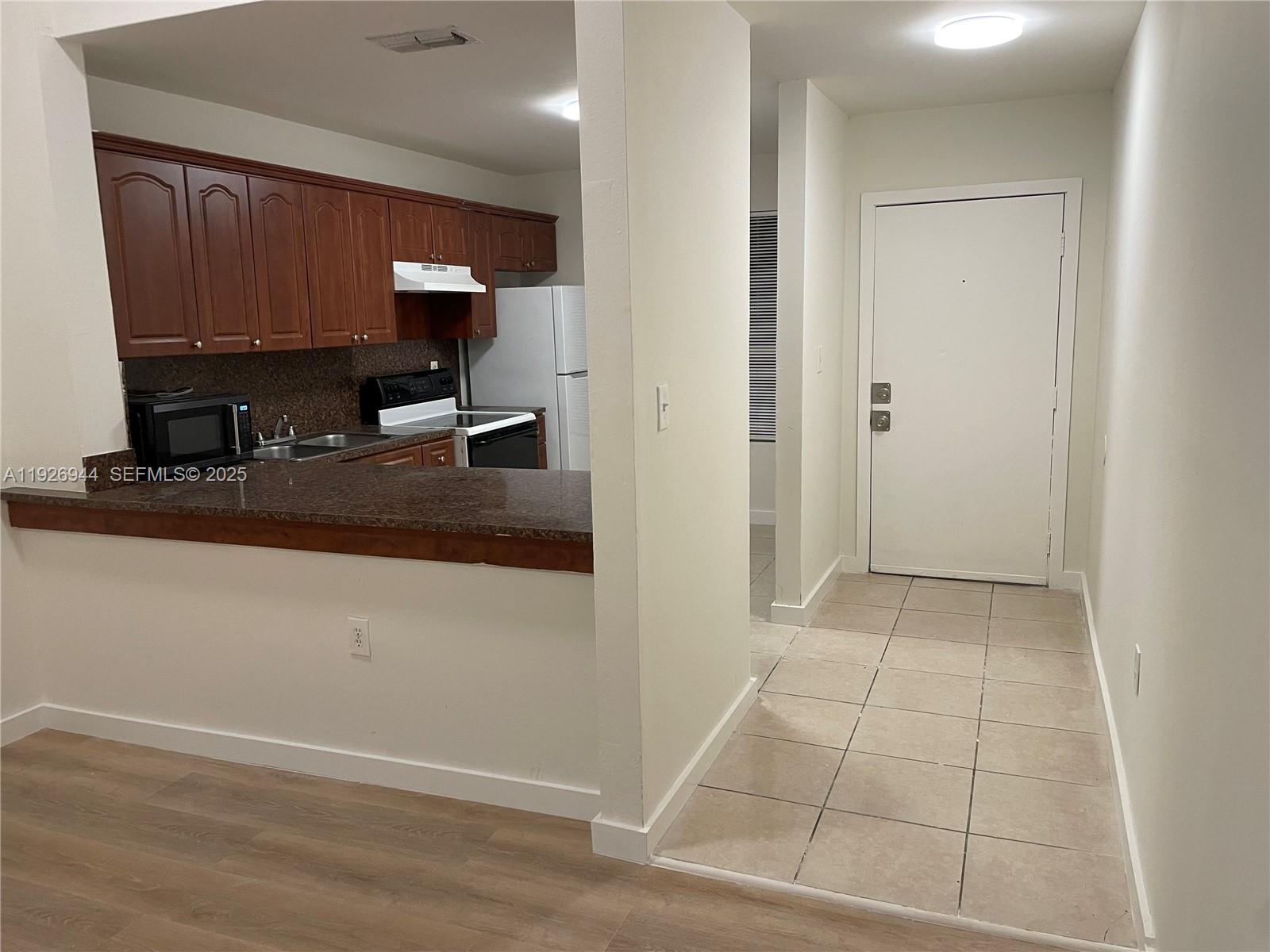2179 Southwest 80th Terrace Miramar, FL 33025 - Photo 14 of 14 a view of a kitchen with a sink and cabinets