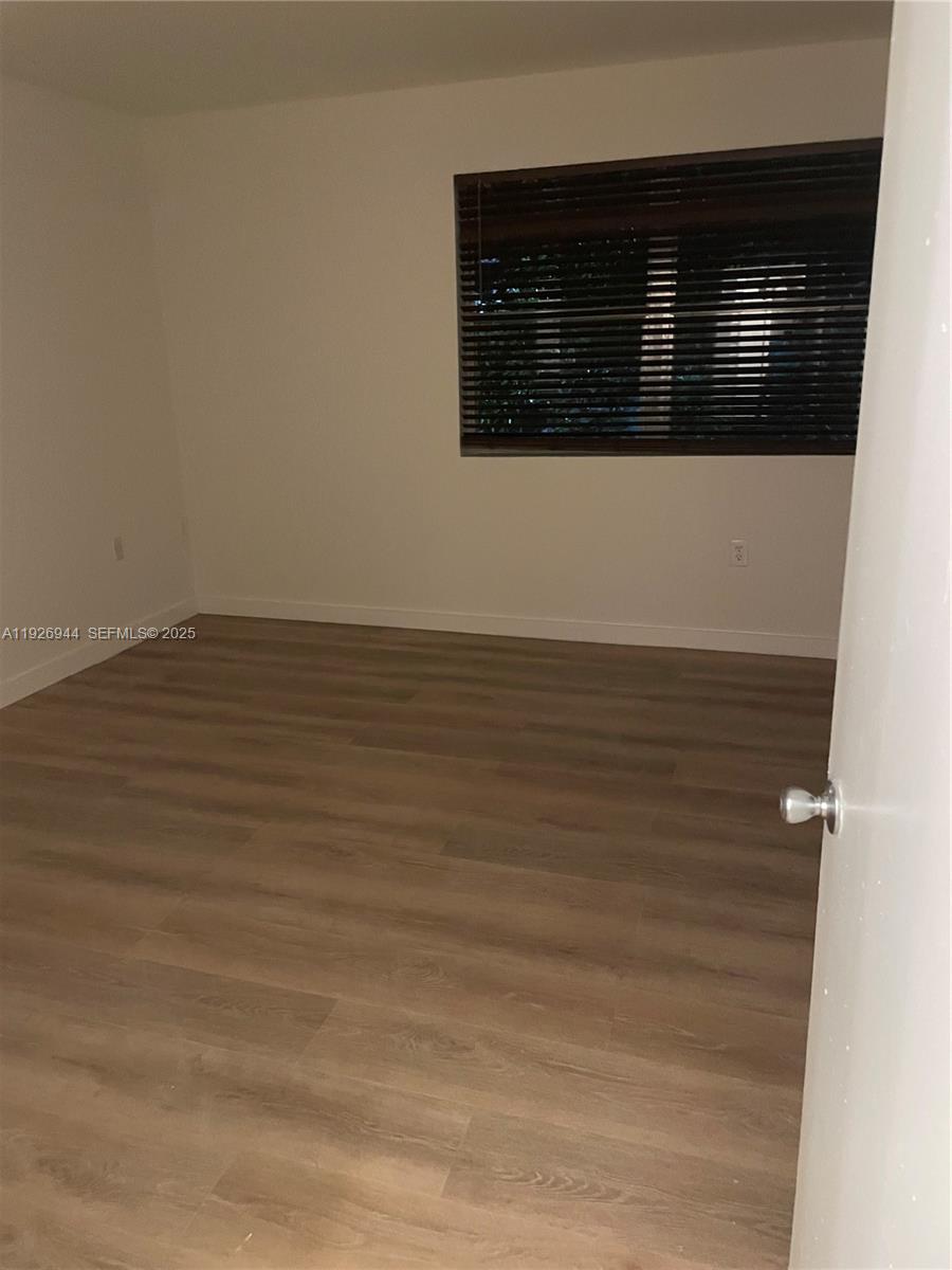 2179 Southwest 80th Terrace Miramar, FL 33025 - Photo 6 of 14 a view of wooden floor and a sink