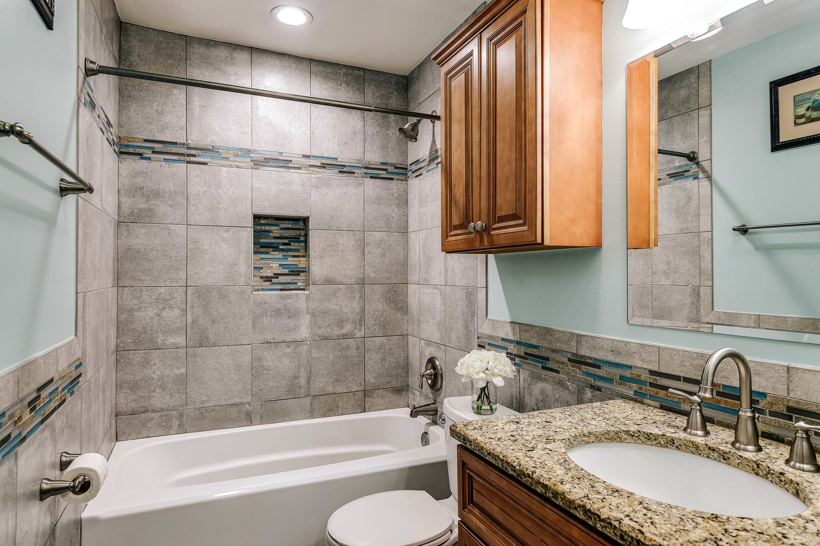 26-w068 Jewell Road Wheaton, IL 60187 - Photo 11 of 25 a bathroom with a granite countertop sink toilet and shower