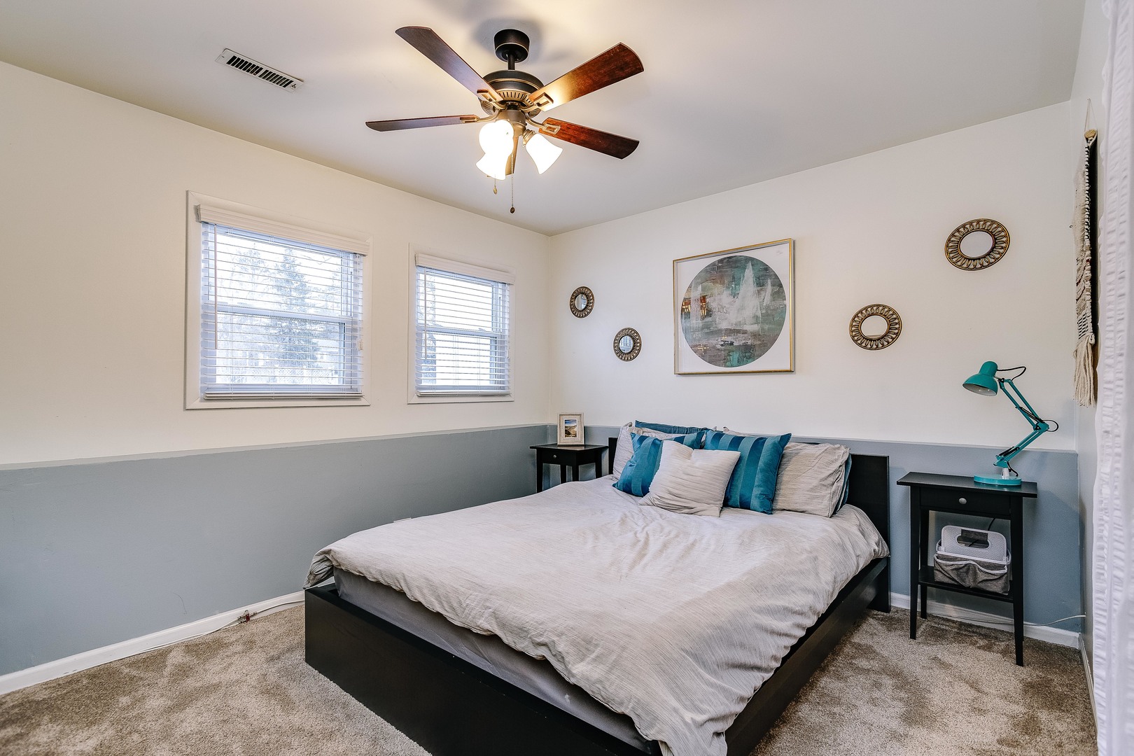 26-w068 Jewell Road Wheaton, IL 60187 - Photo 15 of 25 a bedroom with a large bed and a window