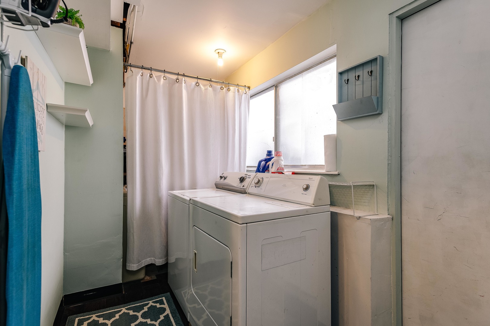 26-w068 Jewell Road Wheaton, IL 60187 - Photo 19 of 25 a bathroom with a sink and a mirror