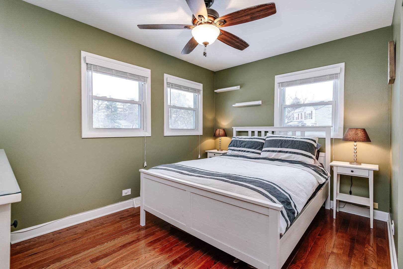 26-w068 Jewell Road Wheaton, IL 60187 - Photo 9 of 25 a bed room with a bed and a window