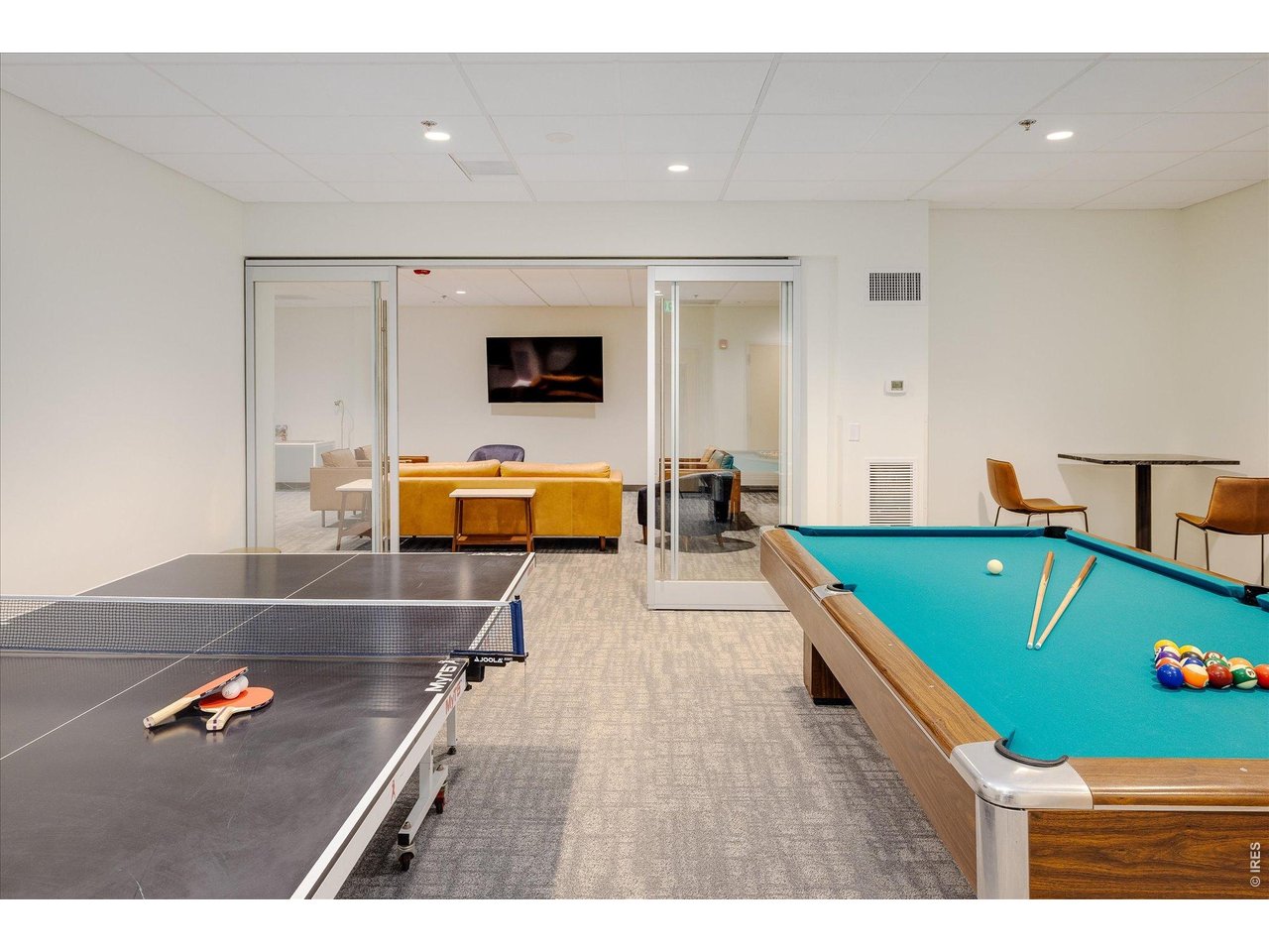 1850 Folsom Street, Unit 503 Boulder, CO 80302 - Photo 16 of 22 a room with pool table and windows