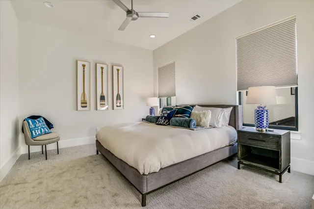 a bedroom with a bed and a couch