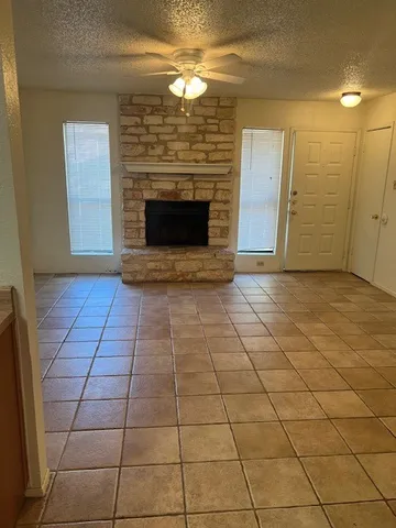 a view of a livingroom with a fireplace