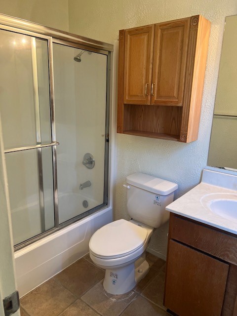 112 Verna Spur, Unit B Georgetown, TX 78628 - Photo 16 of 23 a bathroom with a toilet and a shower