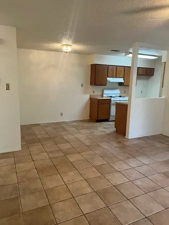 a view of a kitchen with a sink