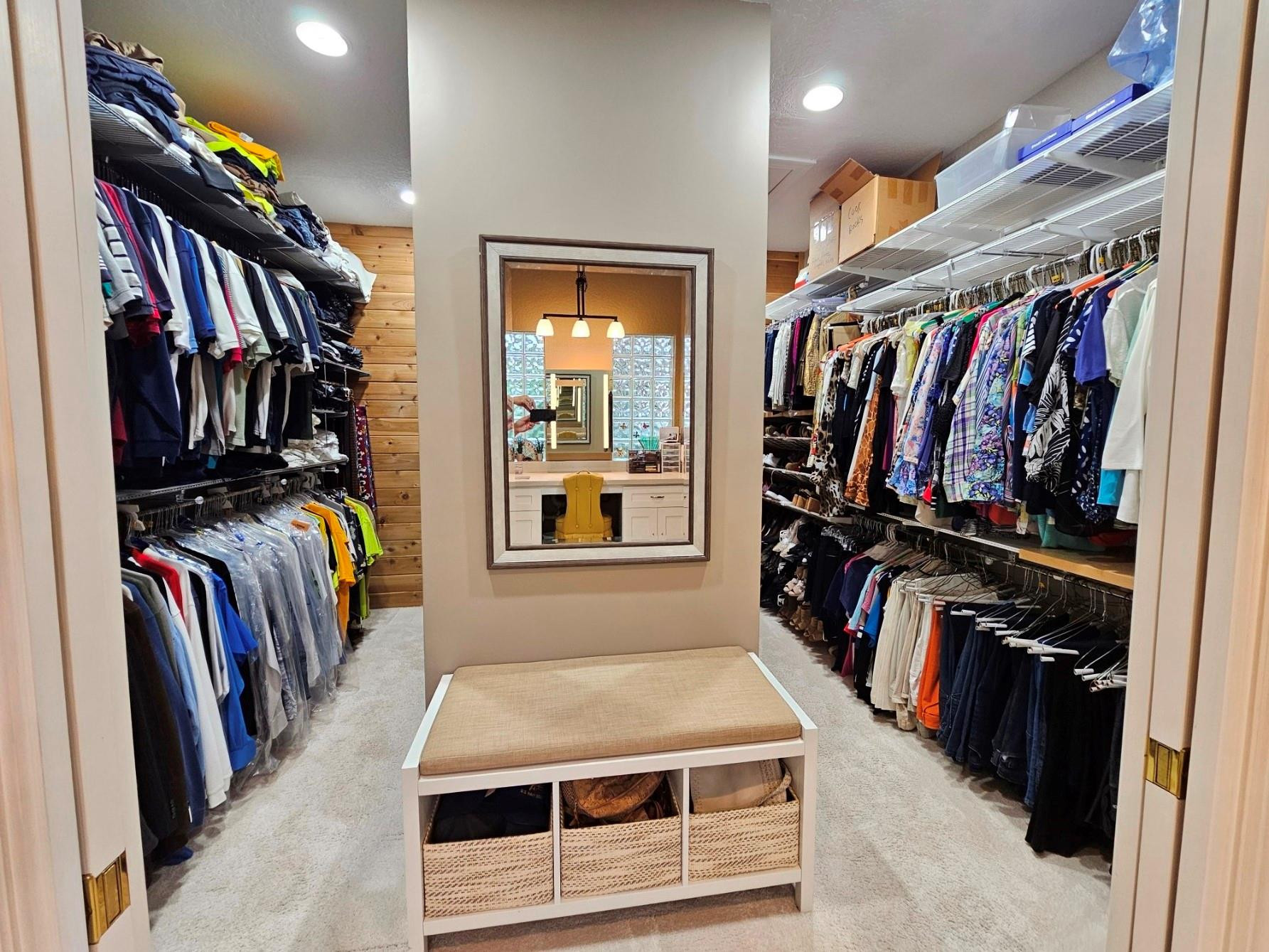 6963 Wilson Road West Palm Beach, FL 33413 - Photo 11 of 29 a view of walk in closet with clothes and shoes