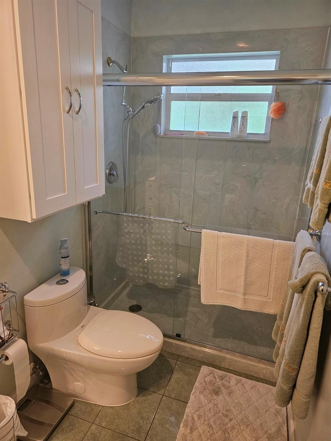 6963 Wilson Road West Palm Beach, FL 33413 - Photo 17 of 29 a bathroom with a toilet and a shower