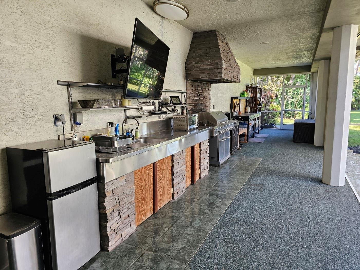 6963 Wilson Road West Palm Beach, FL 33413 - Photo 22 of 29 a kitchen with lots of counter top space