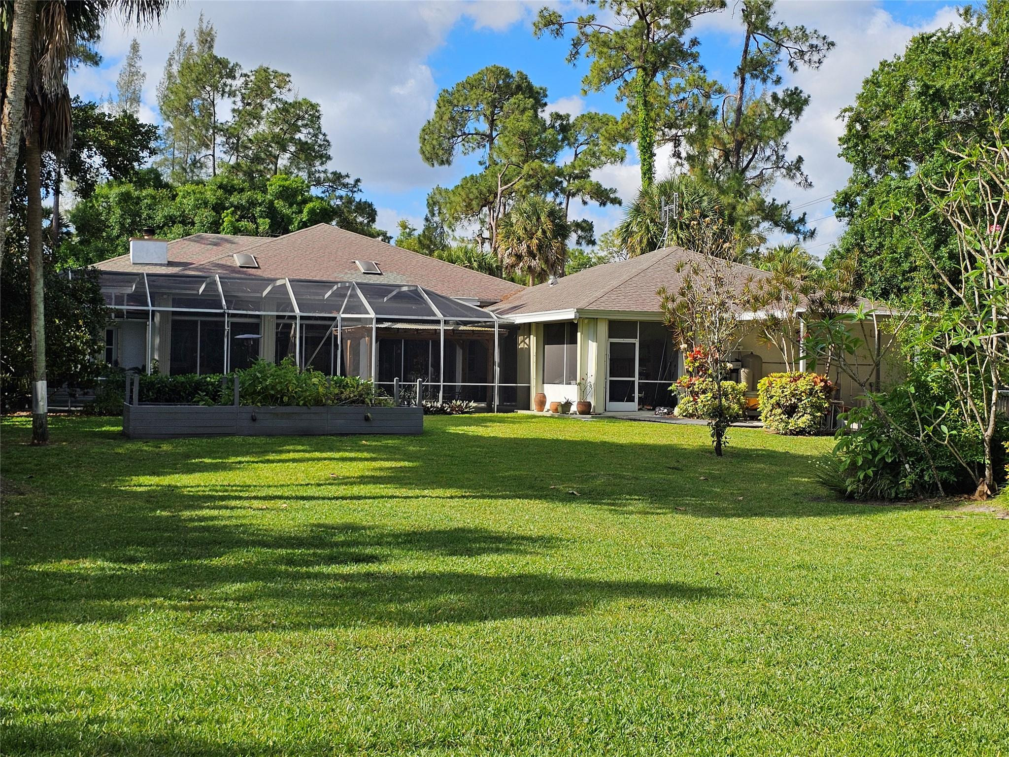 6963 Wilson Road West Palm Beach, FL 33413 - Photo 29 of 29 a front view of house with yard and green space