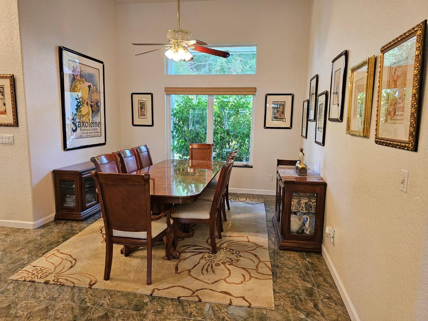 6963 Wilson Road West Palm Beach, FL 33413 - Photo 6 of 29 a dining room with furniture a rug and a window