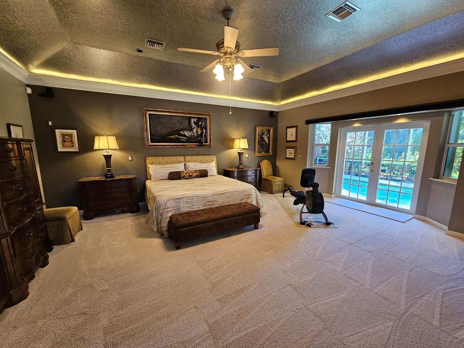 6963 Wilson Road West Palm Beach, FL 33413 - Photo 9 of 29 a bedroom with furniture and a large window