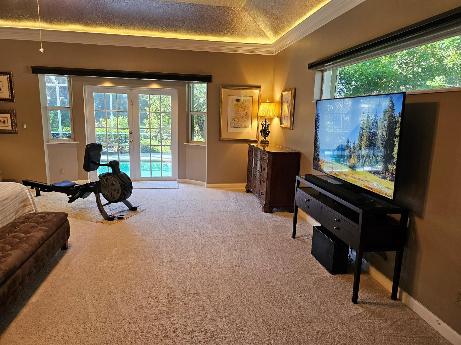 6963 Wilson Road West Palm Beach, FL 33413 - Photo 10 of 29 a living room with furniture tv and large window