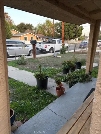 a view of a garden with patio