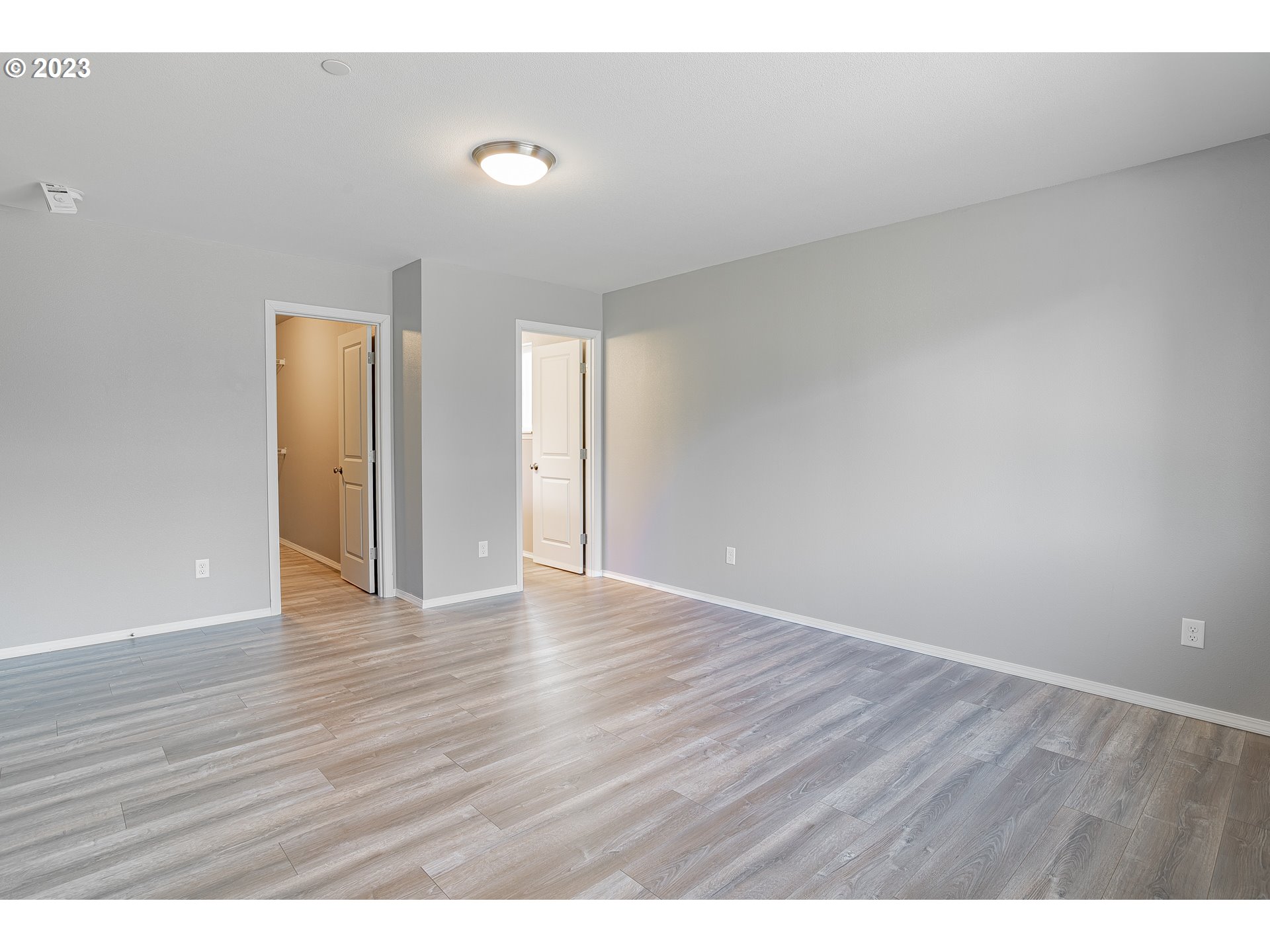 501 Hooper Road Longview, WA 98632 - Photo 15 of 28 a view of an empty room and wooden floor