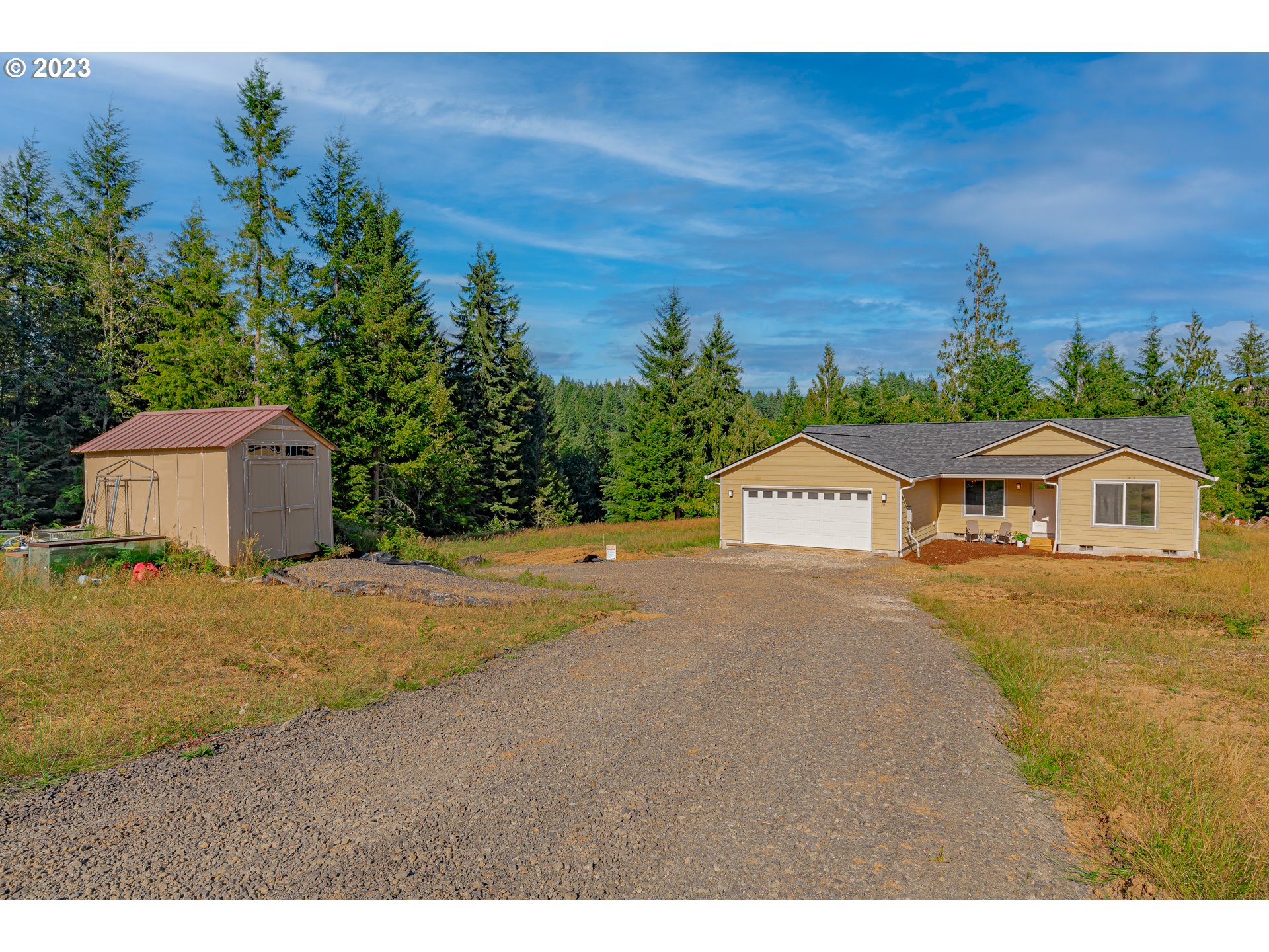 501 Hooper Road Longview, WA 98632 - Photo 24 of 28 a front view of a house with a yard and garage
