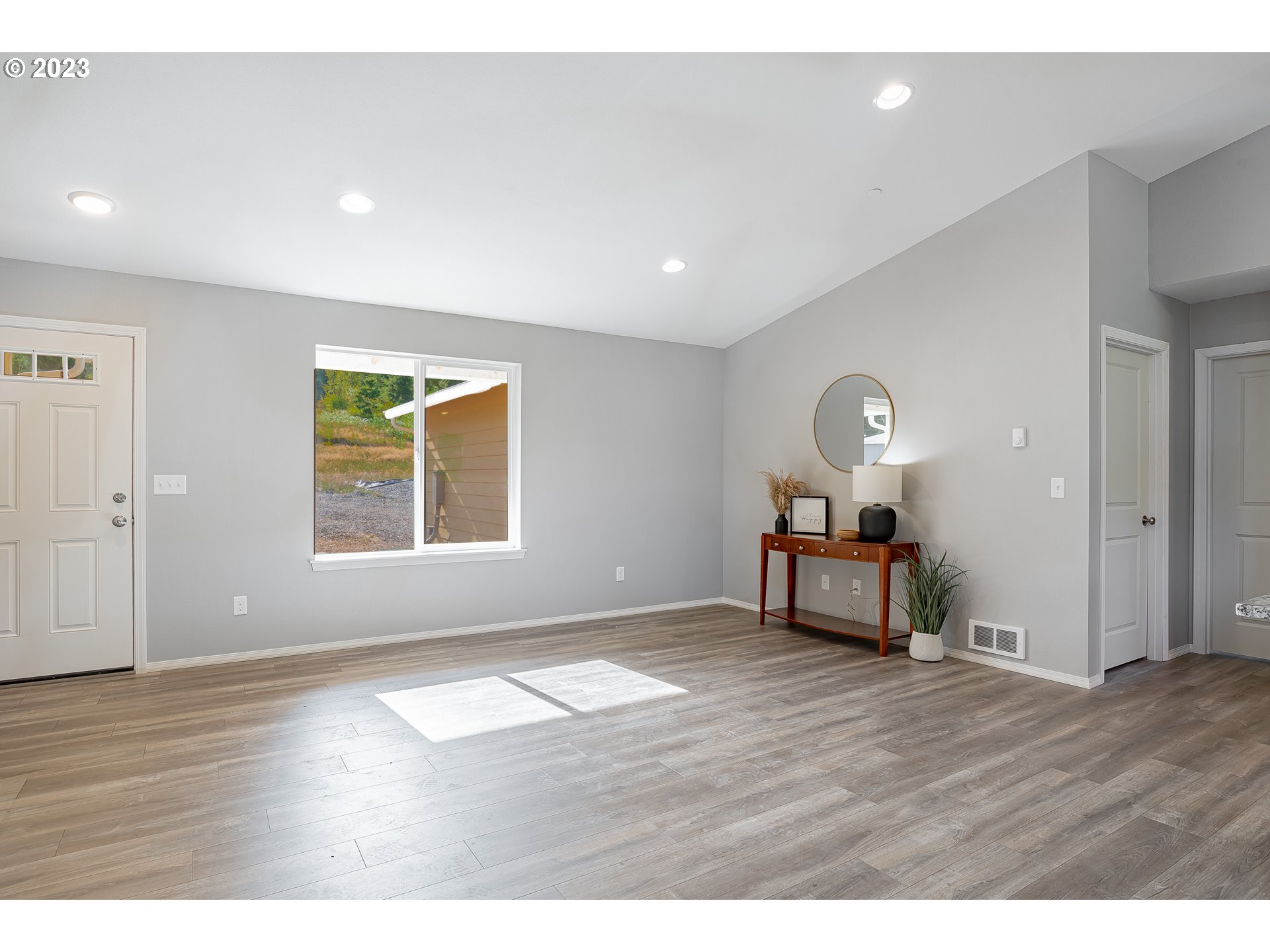501 Hooper Road Longview, WA 98632 - Photo 4 of 28 a view of livingroom with furniture and wooden floor