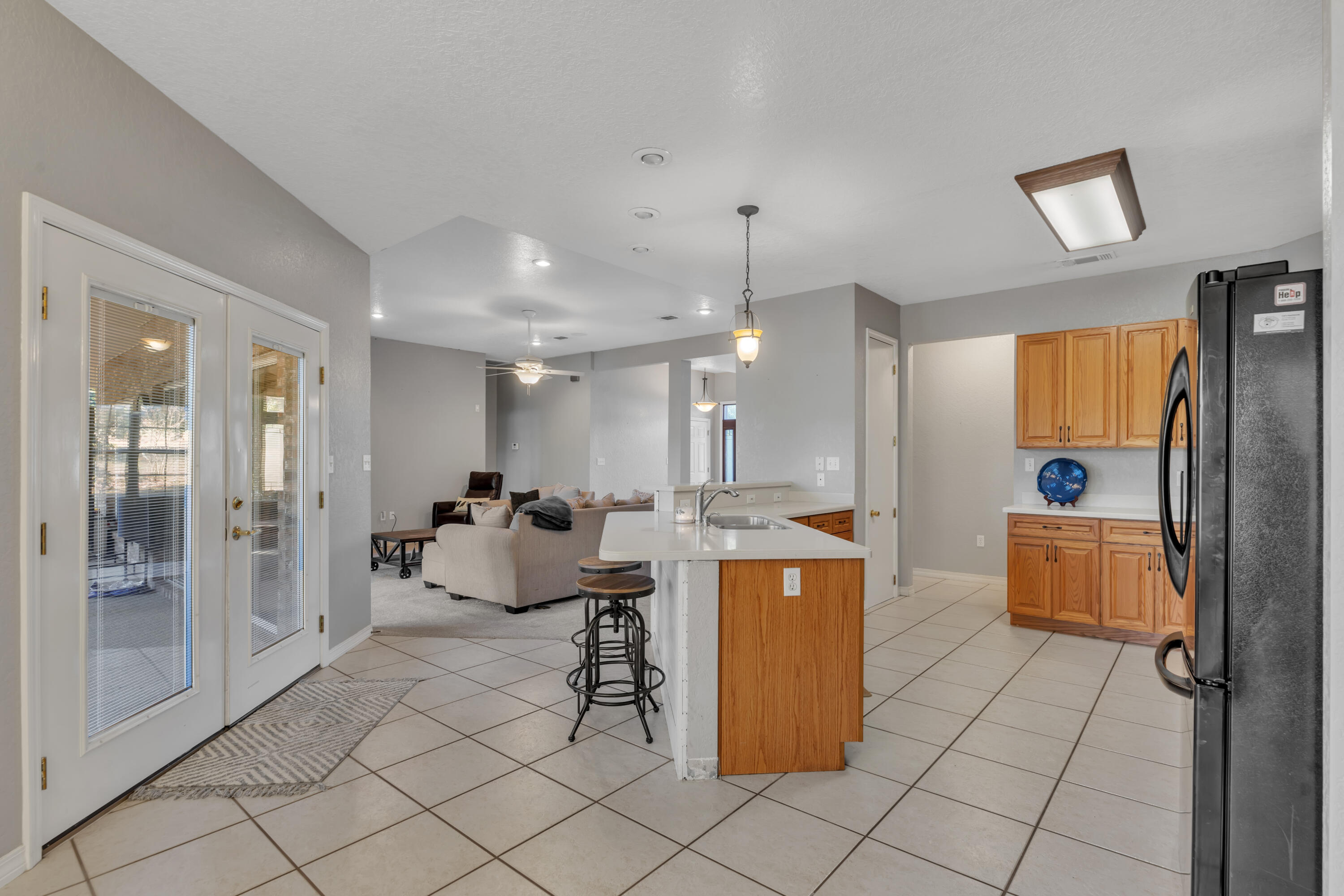 109 Oakcrest Drive Crestview, FL 32539 - Photo 11 of 35 a room with lots of furniture and glass door