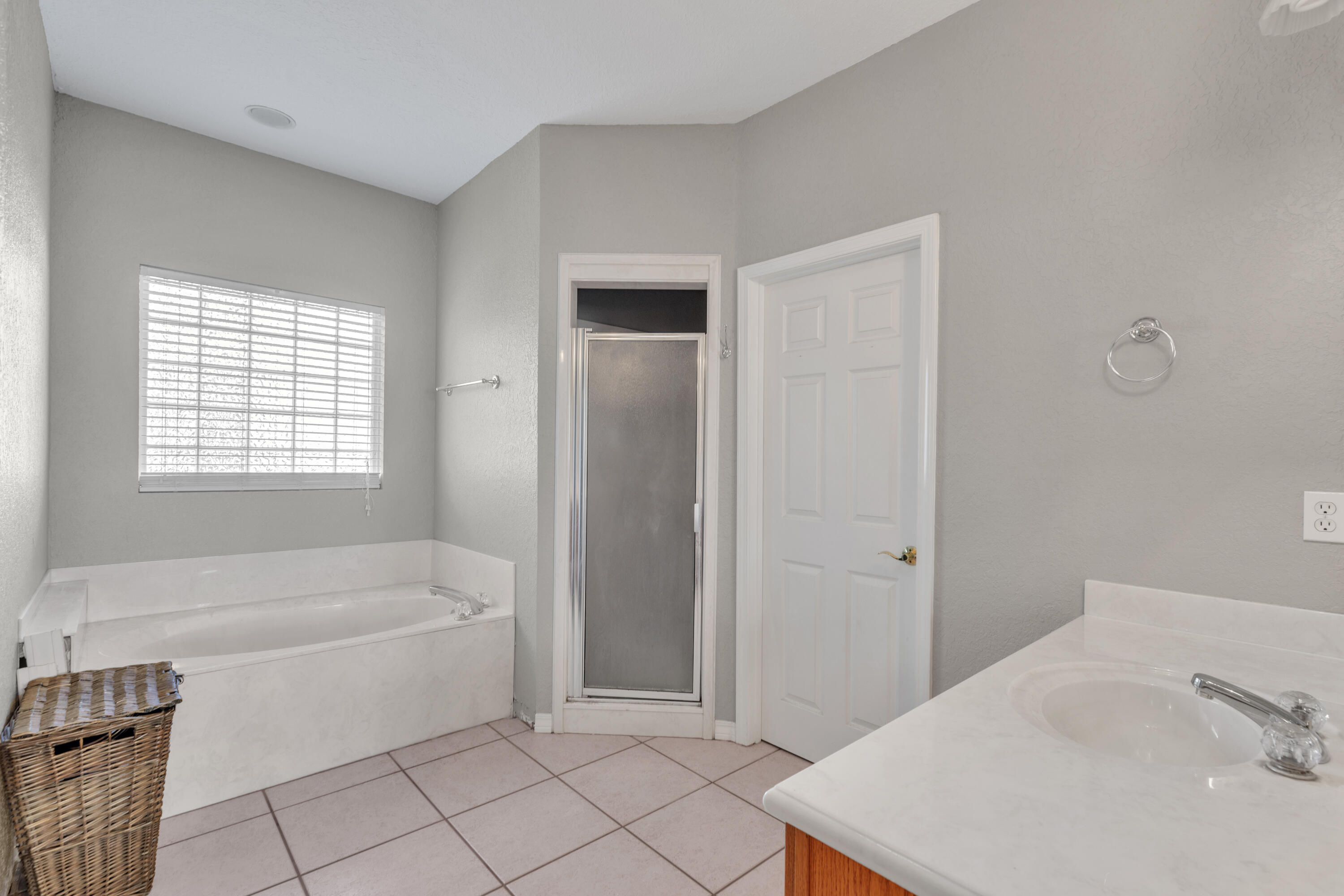 109 Oakcrest Drive Crestview, FL 32539 - Photo 28 of 35 a bathroom with a tub shower and sink