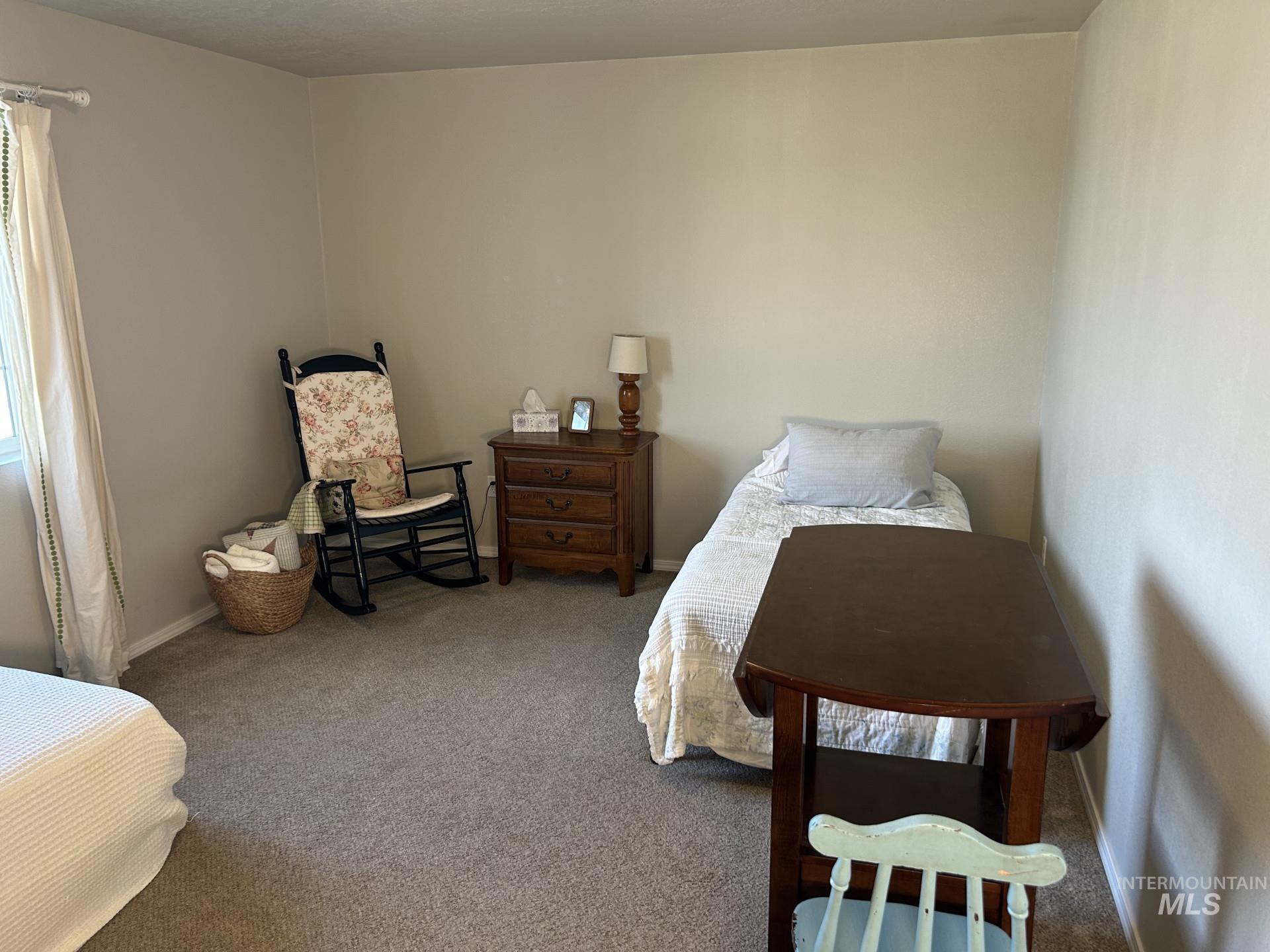 5614 Barkley Way Caldwell, ID 83607 - Photo 32 of 50 Bedroom featuring carpet and baseboards
