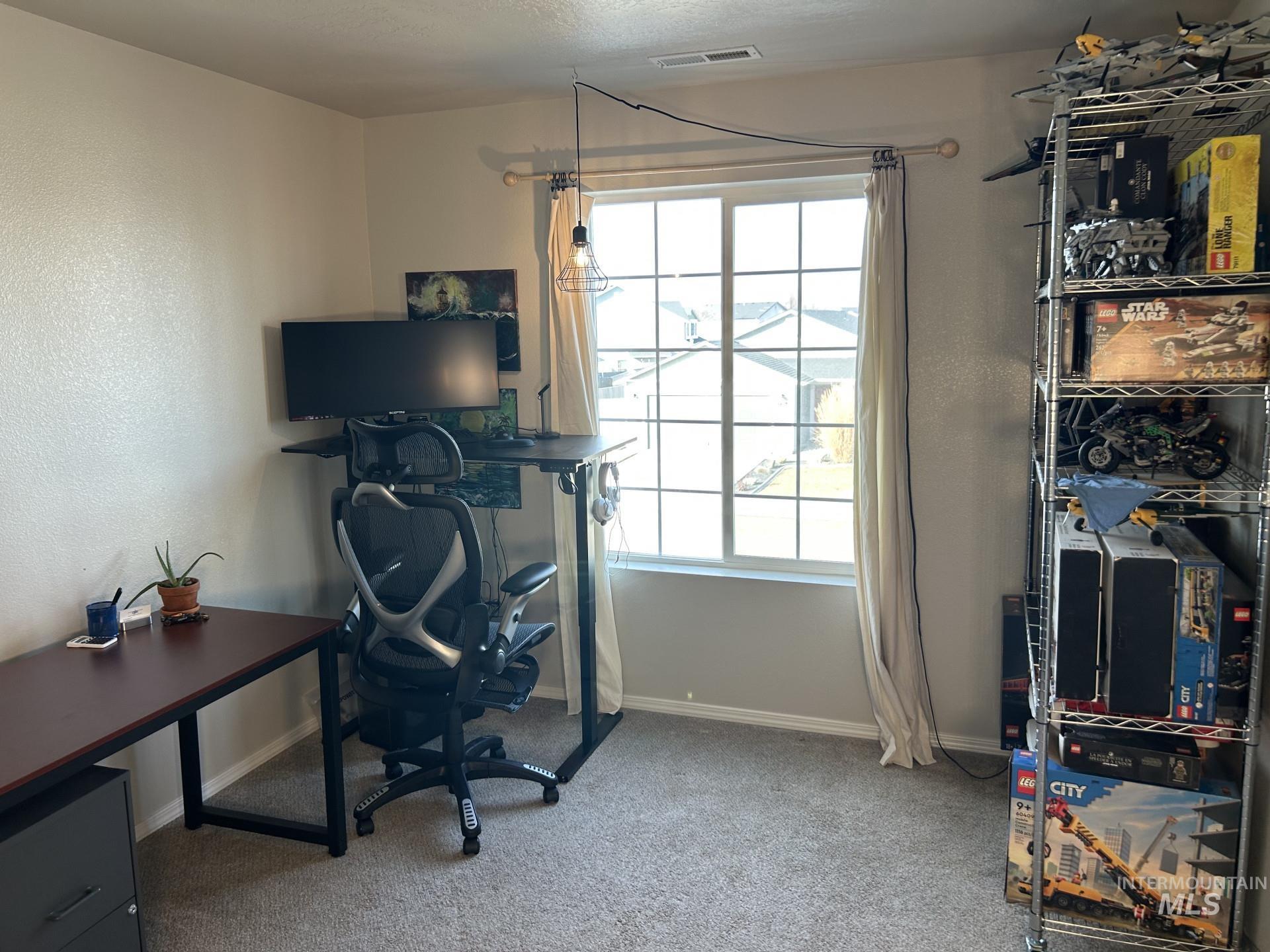 5614 Barkley Way Caldwell, ID 83607 - Photo 36 of 50 Office space with light carpet and baseboards