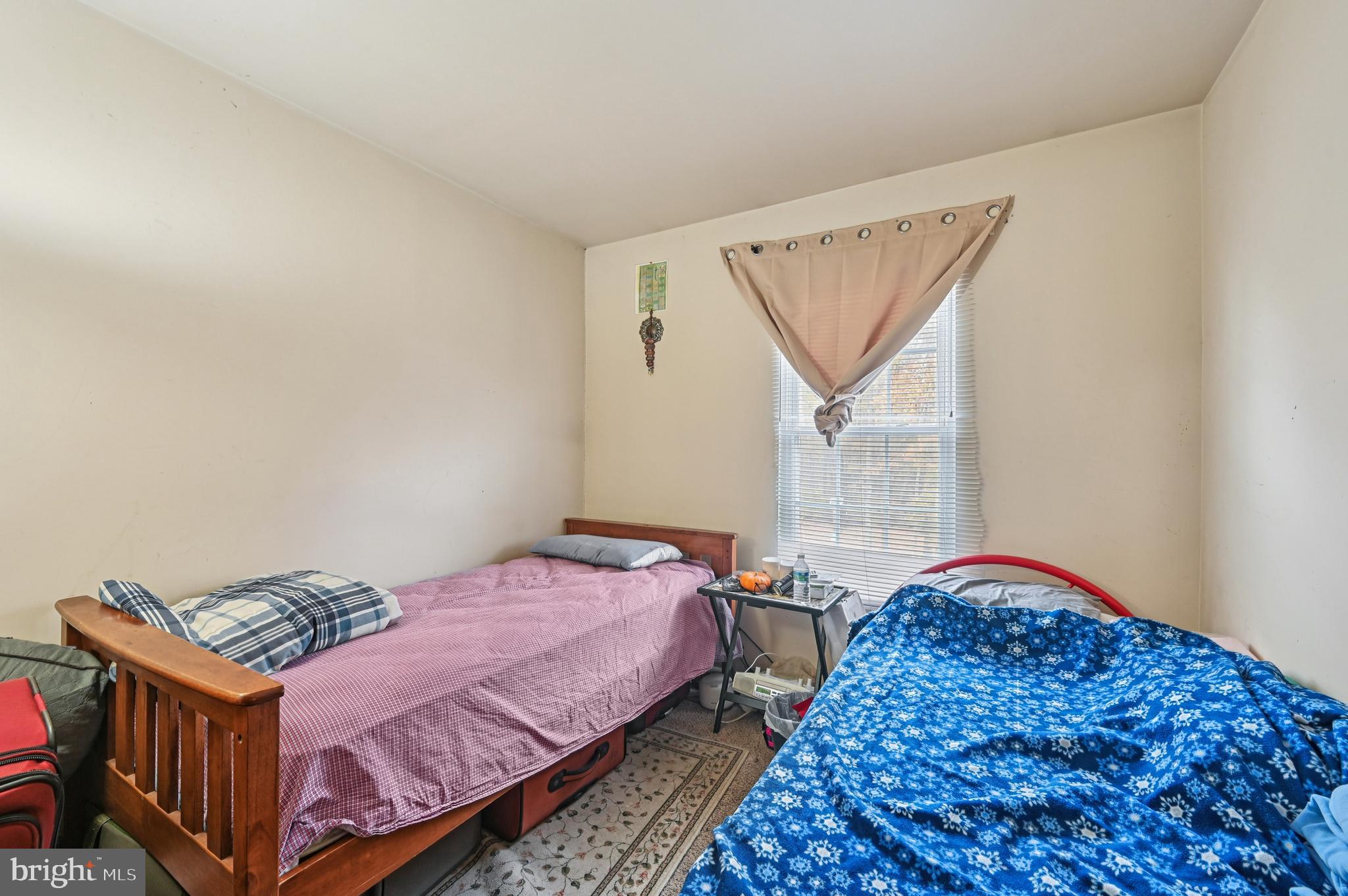 6919 Myersview Drive Baltimore, MD 21220 - Photo 11 of 19 a bedroom with bed and a window