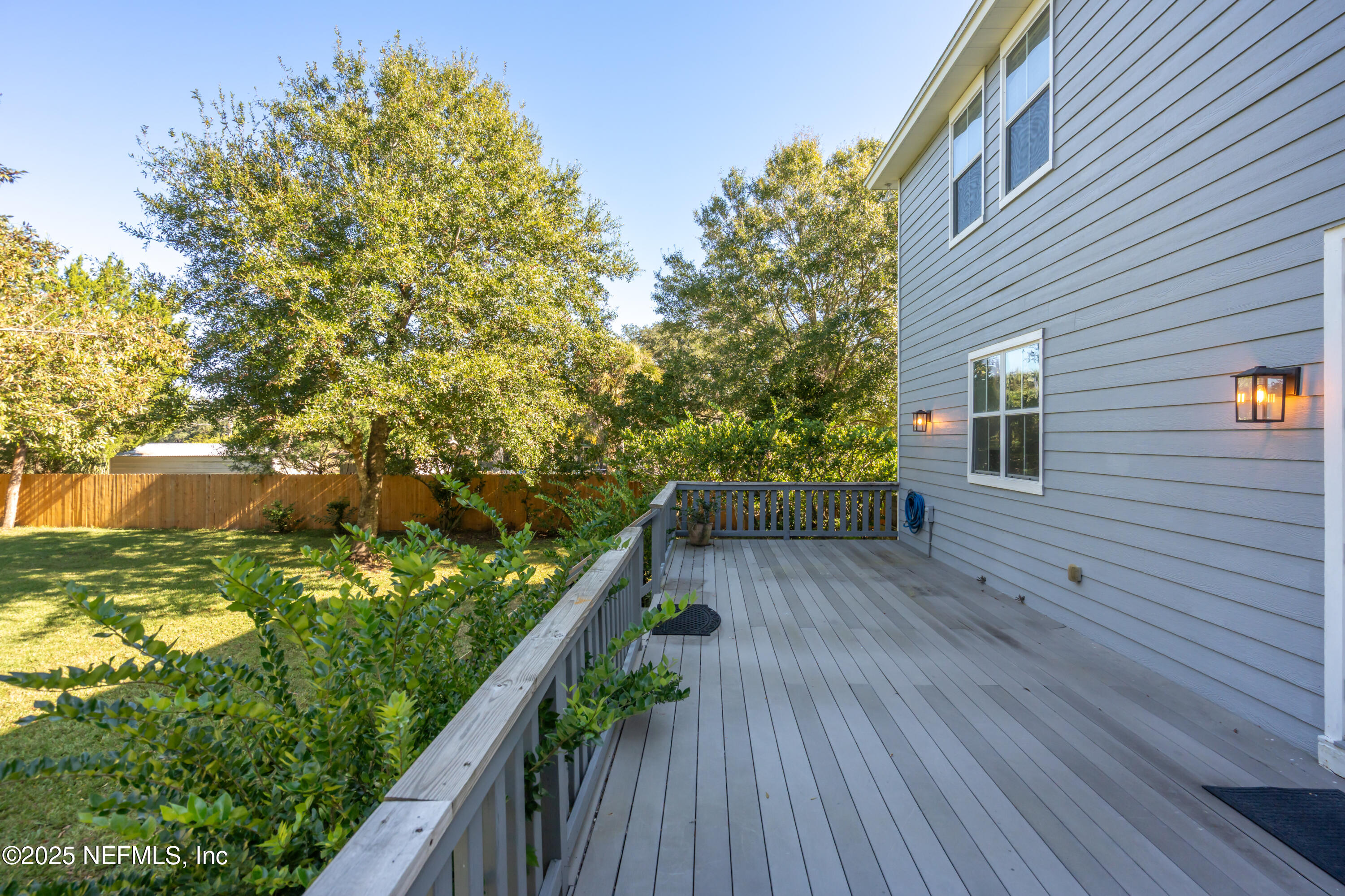 4187 Quail Drive St. Augustine, FL 32084 - Photo 29 of 38 a view of balcony with wooden floor and fence