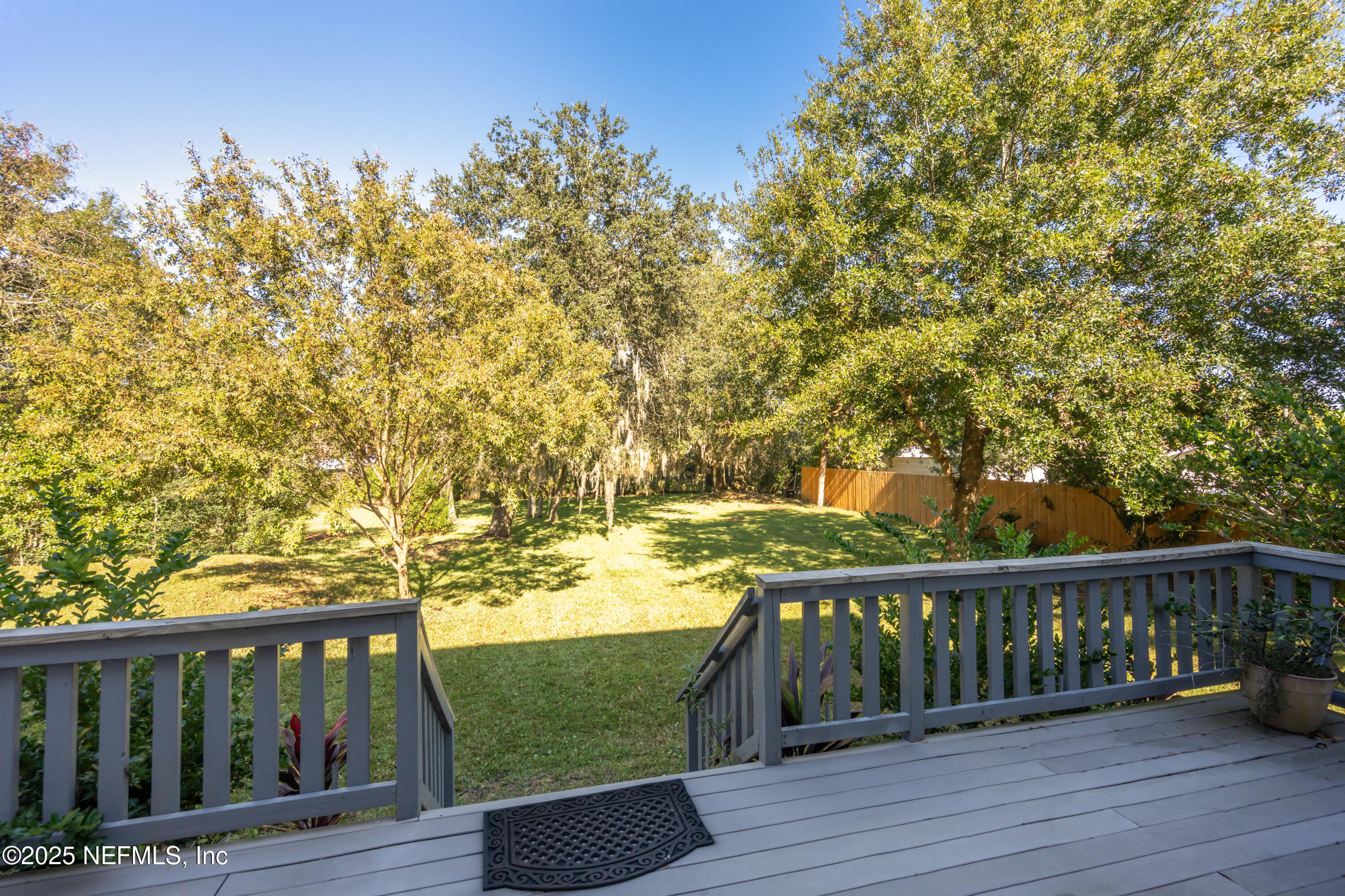 4187 Quail Drive St. Augustine, FL 32084 - Photo 32 of 38 a view of balcony with wooden floor and fence